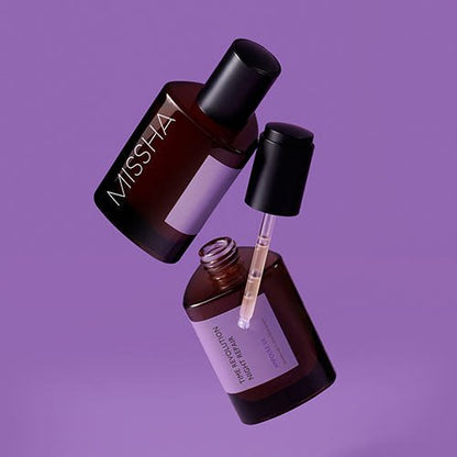 Two dark amber glass ampoule bottles with black caps and purple labels for deep hydration on a purple background