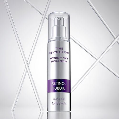 Silver pump bottle of retinol serum with purple label highlighting 1000 IU strength and elasticity boost on light background