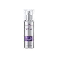 Silver pump bottle of retinol serum with purple label emphasizing 1000 IU and elasticity boosting benefits on white background