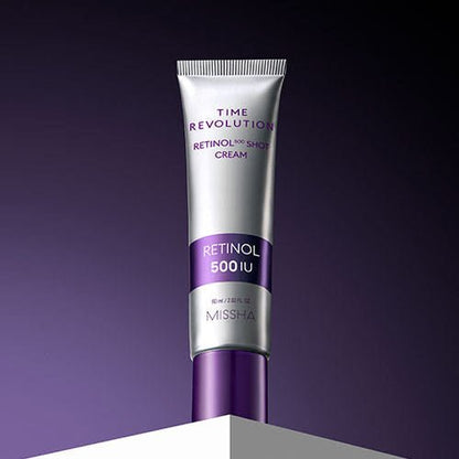 Silver and purple tube of retinol cream emphasizing high potency and enhanced elasticity on a dark purple background