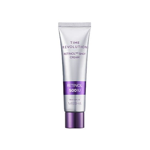 Silver and purple tube of retinol cream with 500 IU strength for enhanced skin elasticity on white background