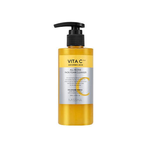 Yellow pump bottle of vitamin C foam cleanser featuring deep cleansing and ascorbic acid on white background