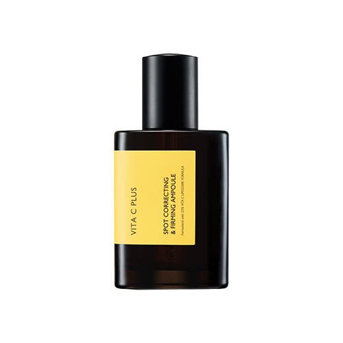 Dark amber bottle with black cap and yellow label for brightening spot correcting and firming ampoule