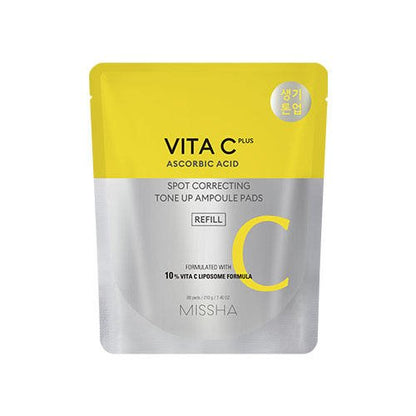 Yellow and silver refill pouch of vitamin C spot correcting tone up ampoule pads with 10% vitamin C formula