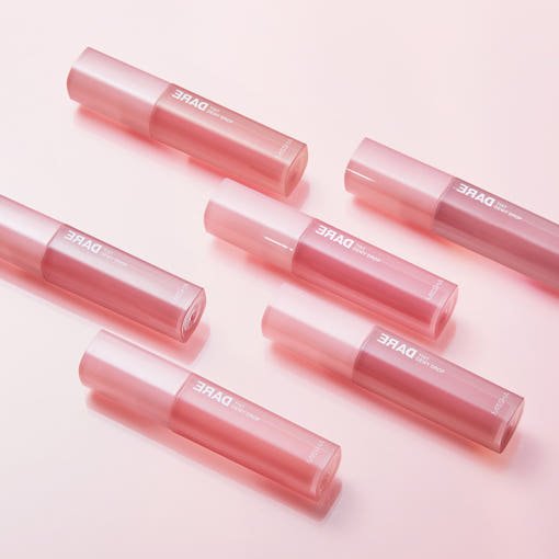 Six pink gradient tint tubes arranged on a soft pink background highlighting long-lasting color benefits