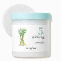 Container of skincare pads labeled with lemongrass illustration and 5 percent niacinamide for balanced hydration benefits