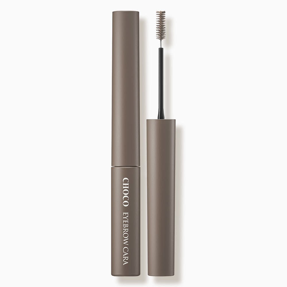 Opened taupe eyebrow mascara tube with slim brush applicator designed for defined brow styling
