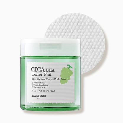 Green translucent jar of BHA toner pads with white lid beside textured round pad on white background