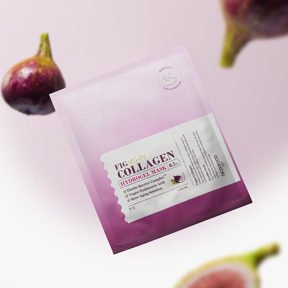 Purple gradient hydrogel mask packet with fig illustrations surrounded by fresh figs on soft pink background