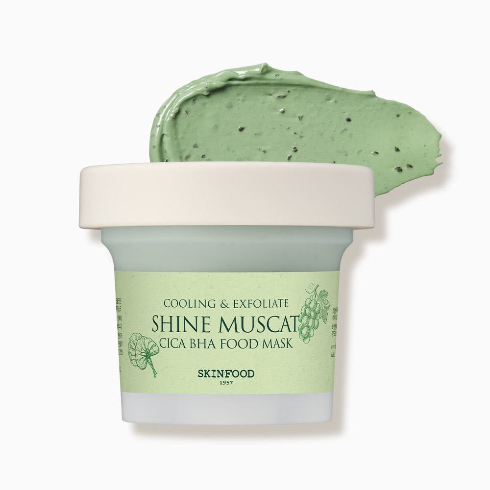 Small jar of light green cooling exfoliating food mask with natural grape and leaf illustrations on label