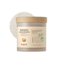 Clear jar of soothing potato extract pads with beige label and natural cork lid on white background