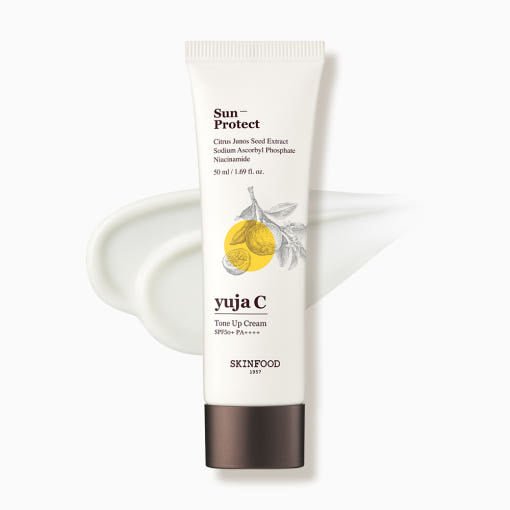 Tube of brightening tone-up cream with yuja citrus illustration and white cream texture on white background