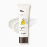 Tube of brightening Yuja C tone-up cream with SPF50+ PA++++ and citrus fruit illustration on white background