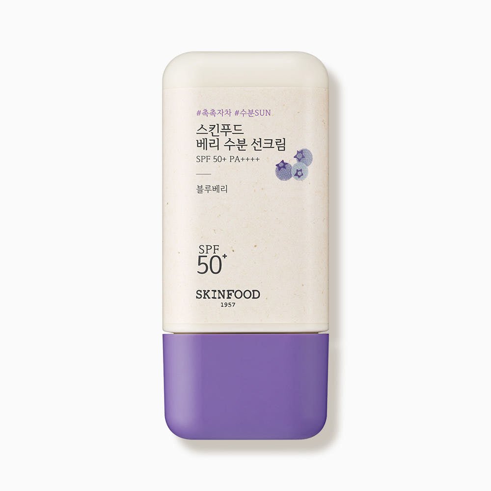 Compact bottle of moisturizing sun cream with SPF50+ PA++++ and purple cap, featuring blueberry design on label
