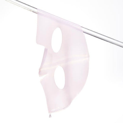 Translucent hydrogel face mask sheet hanging with liquid droplet emphasizing hydration boost benefits