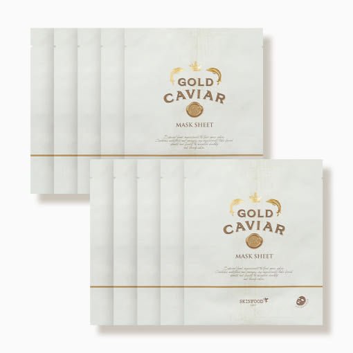 Ten white mask sheet packets with gold and brown lettering highlighting nourishing formula and gold caviar essence.