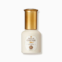 Small white bottle with gold cap featuring Gold Caviar EX Lifting Eye Serum label highlighting firming action benefit