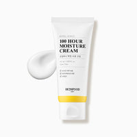 White squeeze tube of moisturizing cream with yellow accent and a smooth dollop of cream beside it on white background