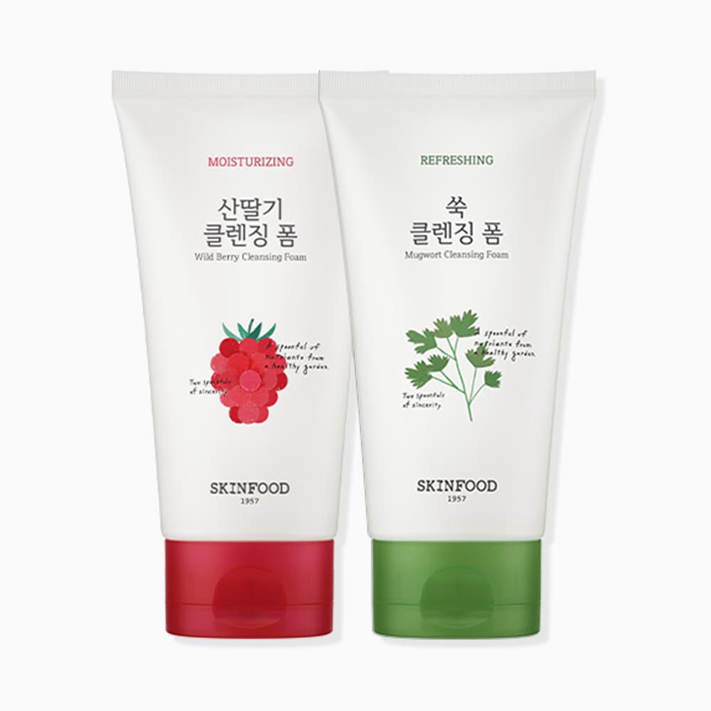 Two cleansing foam tubes with red and green caps featuring wild berry and mugwort illustrations on white background