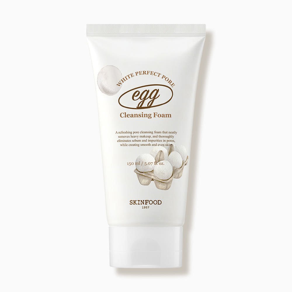 White cleansing foam tube with egg illustration and minimal text highlighting deep pore cleansing benefits