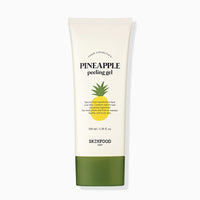 Tube of gentle exfoliating pineapple peeling gel with simple white and green packaging and a pineapple illustration on front