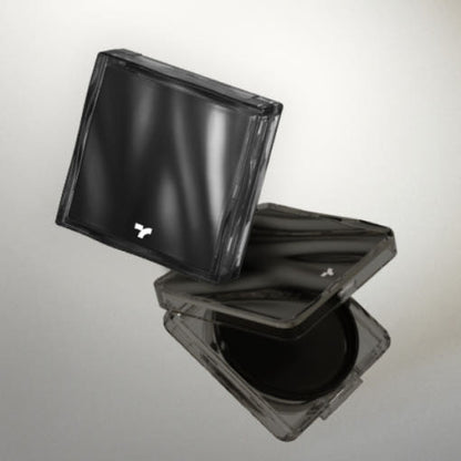 Compact black cushion case opened to reveal deep-tone foundation with sleek minimal design and high coverage effect