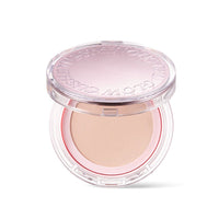 Open compact of luminous gel glow cushion foundation with light beige shade and clear lid on white background