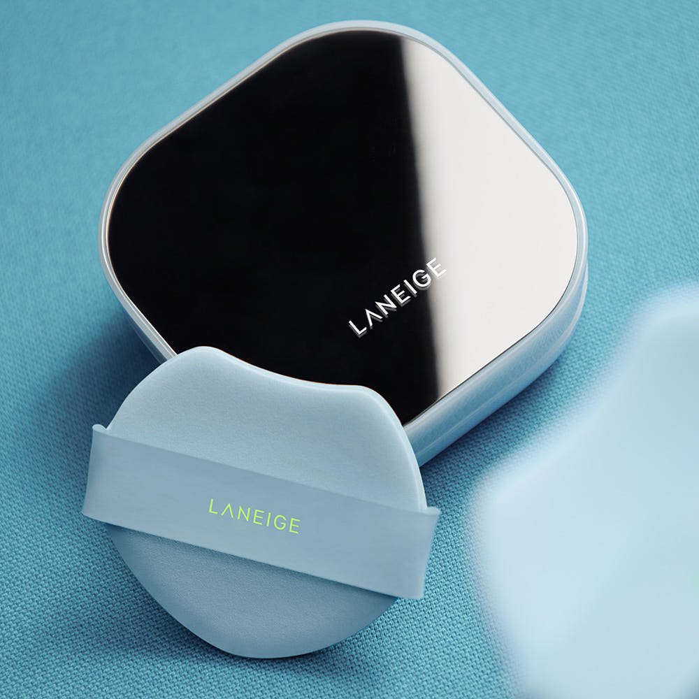 LANEIGE Neo Cushion Mewy SPF42 PA++ SET (15g+15g Refill) in sleek reflective case with soft blue applicator cushion offering natural coverage