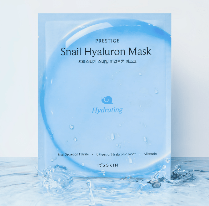 Blue hydrating facial mask packet standing on water surface with splashes on light background