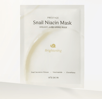 Elegant white sachet of brightening snail niacin mask with snail icon and key ingredients listed on front