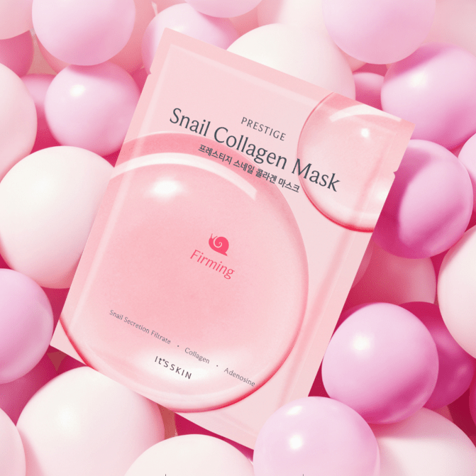 Pink packaging of a snail collagen firming mask surrounded by soft pastel pink spheres for enhanced elasticity care