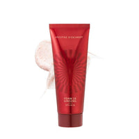 Red tube of ginseng-infused foam cleanser with smooth texture and subtle exfoliating particles on white background