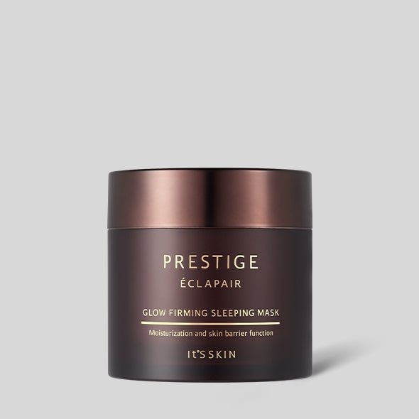 Brown jar with metallic lid of firming glow sleeping mask for skin hydration and barrier support on gray background