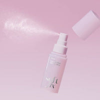 ETUDE Soft Fix Makeup Fixer 50ml in light pink bottle spraying fine mist for long-lasting hold makeup setting