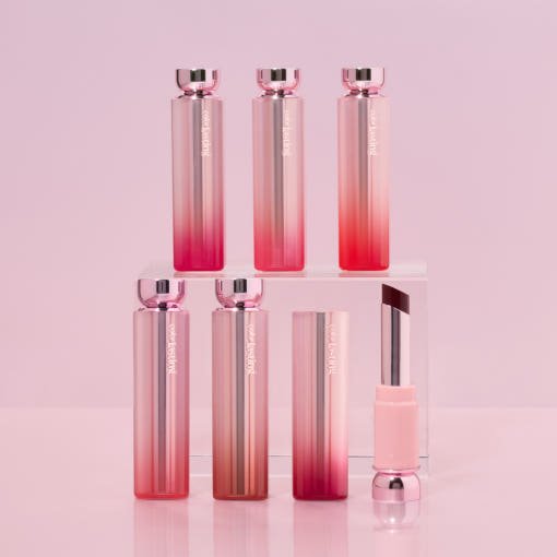 ETUDE Color Lasting Glow Stick 3.2g with hydration boost in sleek pink gradient packaging arranged on display