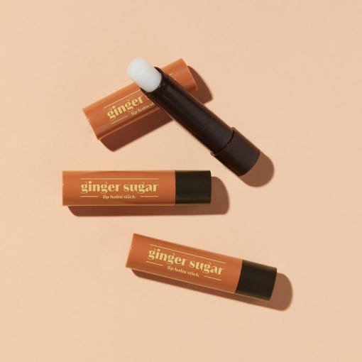 ETUDE Ginger Sugar Lip Balm Stick 3.7g in warm orange tubes with smooth balm tip for hydration boost