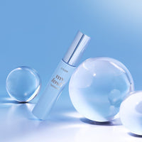 ETUDE My Lash Serum 18g with sleek silver cap and clear droplets on glossy blue surface highlighting lash strengthening benefits