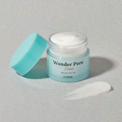 ETUDE Wonder Pore Cream 75ml in light blue jar with open lid and creamy texture emphasizing oil control benefits