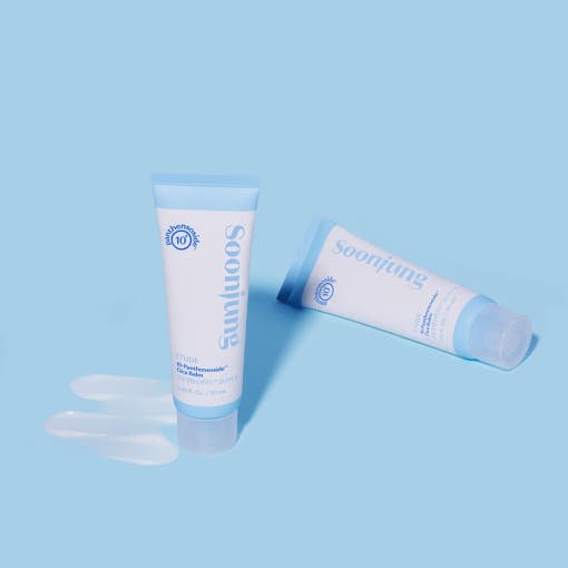 ETUDE Soonjung 10-Panthensoside Cica Balm 50ml tubes on blue background with creamy balm swatches for soothing effect