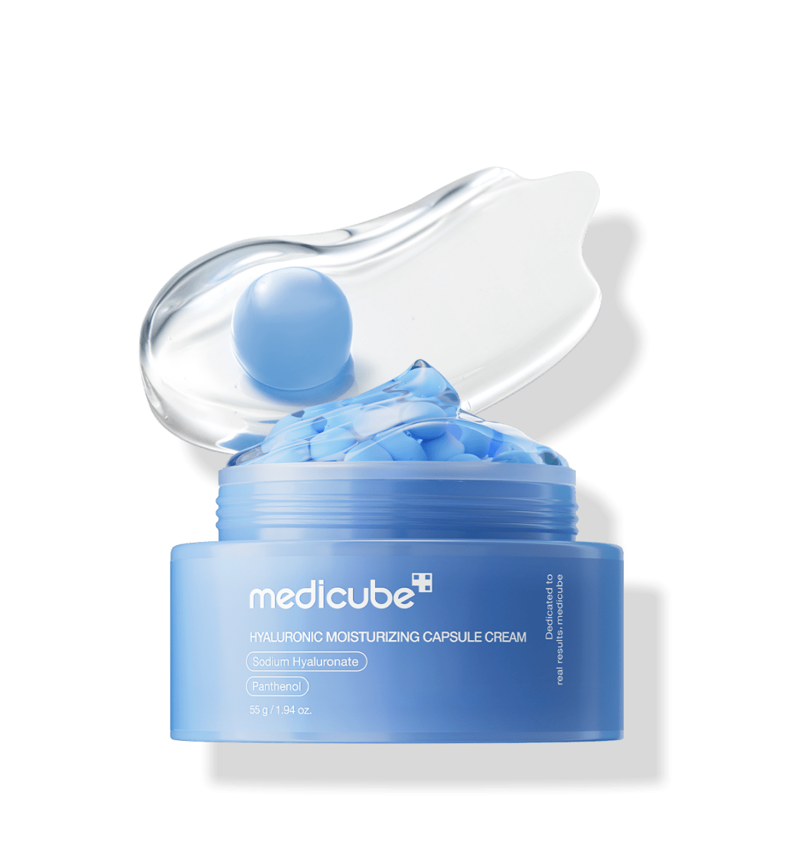 medicube Hyaluronic Moisturizing Capsule Cream 55g in blue jar with deep hydration capsules and clear gel smear