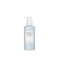 Light blue pump bottle of gentle cleansing milk with moisture retention benefits on plain background