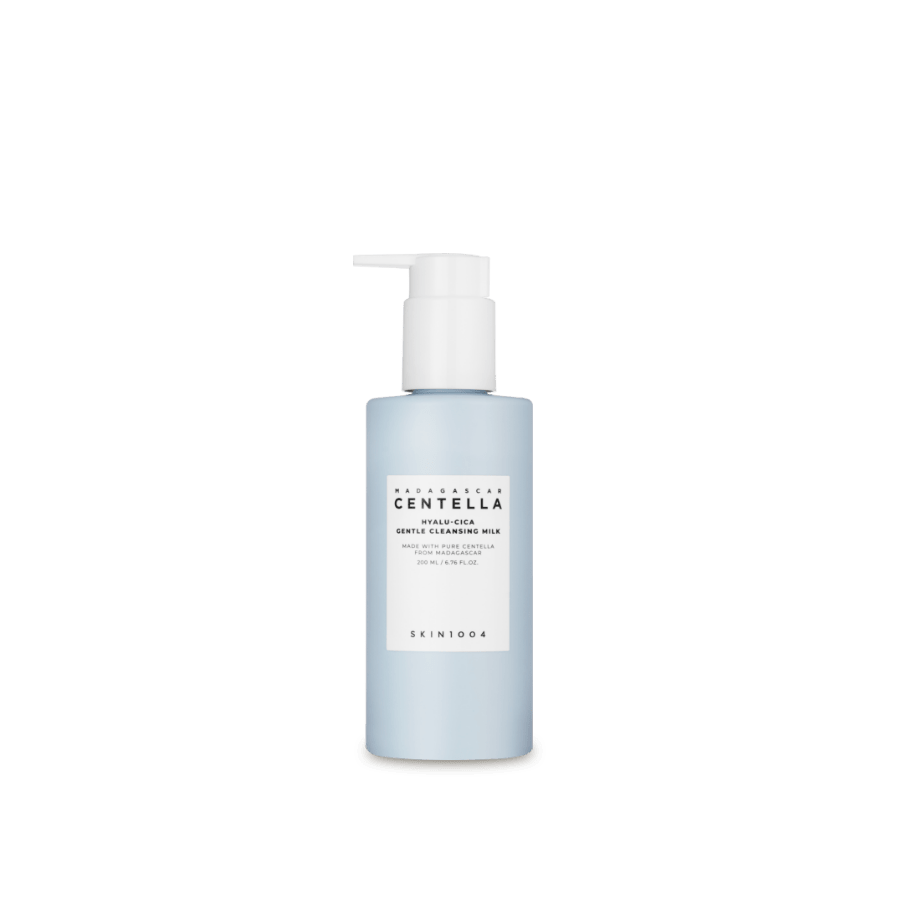 Light blue pump bottle of gentle cleansing milk with moisture retention benefits on plain background