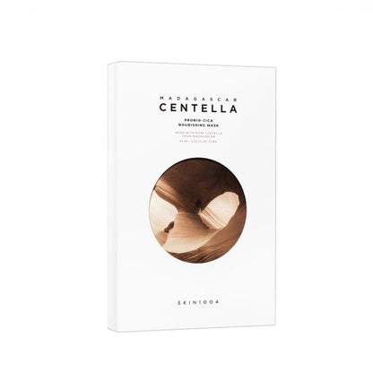 White box packaging of nourishing mask set with circular window showing natural brown rock formation design inside