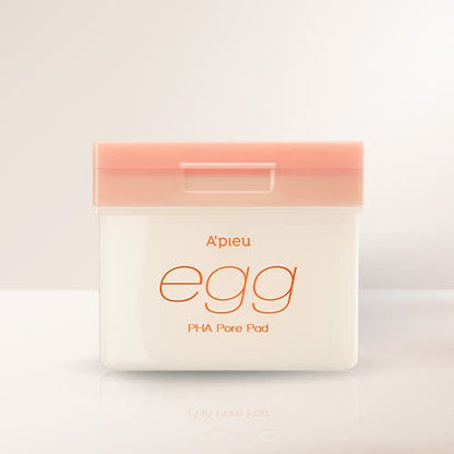 A'pieu Egg PHA Pore Pad 180g/80ea in white container with soft pink lid for gentle exfoliation and pore care