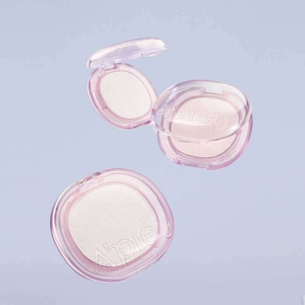 A'pieu Juicy Pang Gleaming Highlighter 4.7g (2 Colors) in translucent glow with pink compact cases