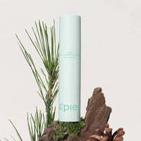 A'pieu Men's All Cover Calming Foundation 12g (2 Colors) in mint tube with natural calming ingredients background