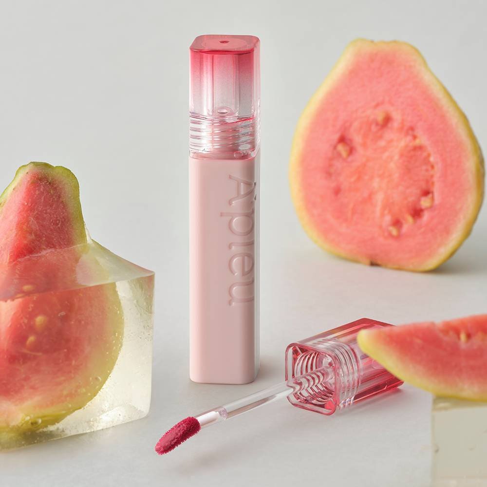 A'pieu Juicy Pang Jelly Tint 3.5g with hydrating formula shown alongside fresh guava fruit slices.