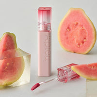 A'pieu Juicy Pang Jelly Tint 3.5g with hydrating formula next to fresh guava slices and clear gel cubes
