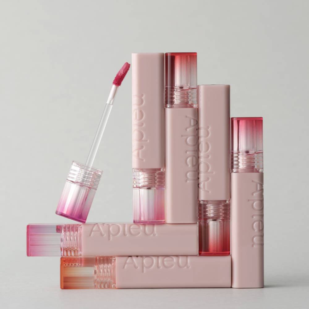 A'pieu Juicy Pang Jelly Tint 3.5g tubes in soft pink packaging with gradient caps and hydrating formula visible on applicator brush