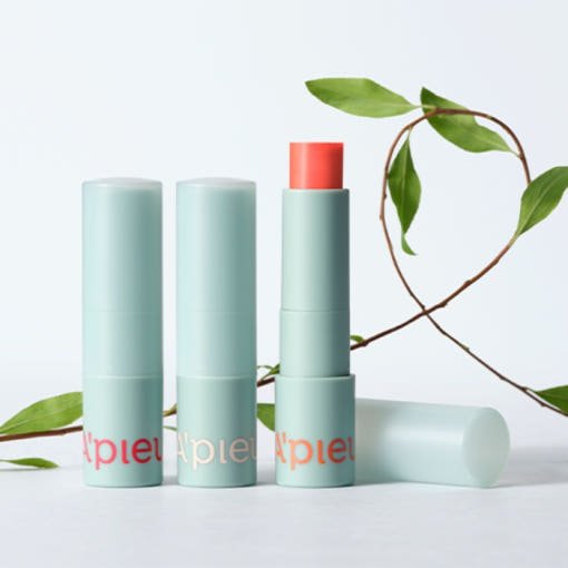 A'pieu Juicy Pang Care Lip Balm 3.7g (3 Colors) in pastel mint tubes with vibrant coral balm and green leaf accent